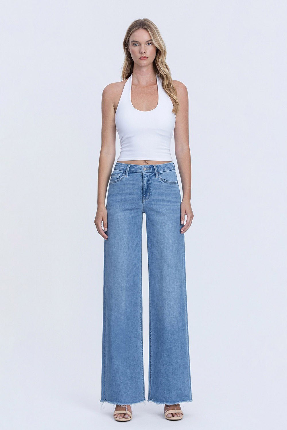 High Rise Medium Wash Frayed Hem Wide Leg Jeans